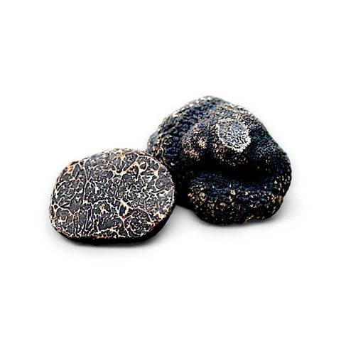 Black truffles with textured surfaces.