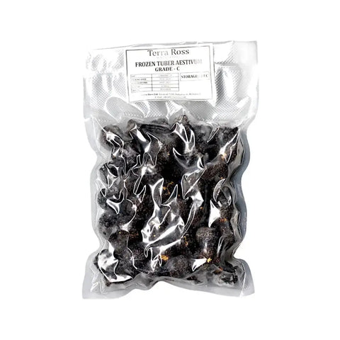 Bag of frozen summer truffles Tuber Aestivum C-grade for culinary use