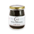 Glas mit Trüffelsauce, goldenem Deckel und Etikett, Salsa Tartufata mit schwarzem Inhalt